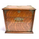 A VICTORIAN OAK TABLE TOP STATIONERY CABINET with hinged top opening to fitted interior, and