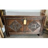 A 19TH CENTURY OAK COFFER the two panel front with lozenge carved decoration, 102cm wide 42cm deep