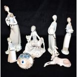 A GROUP OF LLADRO ITEMS: Model 1210 Puffer Fish; model 4679 Donkey; model 4813 girl with calf (