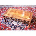 A CHINESE HARDWOOD 'OPIUM' TABLE with pierced and carved frieze, the rectangular top 76cm x 41cm,