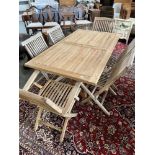 A GARDEN TABLE & 6 FOLDING CHAIRS The hardwood rectangular table 160cm long & 90cm wide Condition