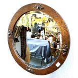 A CIRCULAR WALL MIRROR with copper frame, 54.5cm diameter Condition Report : bevelled mirror good