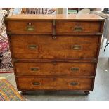 A VICTORIAN BRASS MOUNTED TWO SECTION CAMPAIGN CHEST of two short and three long drawers on turned