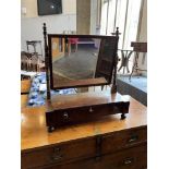 A 19TH CENTURY MAHOGANY DRESSING TABLE MIRROR the base fitted with three drawers, 54cm wide