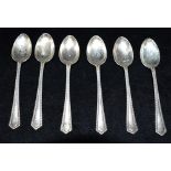 SIX STERLING SILVER TEASPOOONS With chevron decoration to edges. Hallmarked Birmingham 1898.