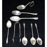 ASSORTED SILVER INCL T.H. OLSEN SPOON Set of six Apostle teaspoons and matching sugar tongs.