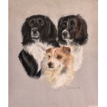 S. UCK BOIMILL (?) Head studies of two spaniels and a terrier, pastel, signed and dated '87, 50.5