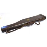 A LET OF MUTTON GUN CASE IN DARK BROWN LEATHER An engraved brass plaque with initials 'D.A.H' and