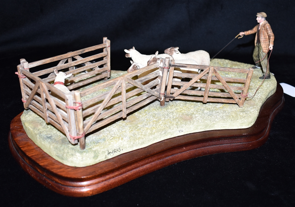A BORDER FINE ARTS GROUP Of a shepherd and his collie dog driving sheep into a pen, length 42cm, - Image 2 of 2