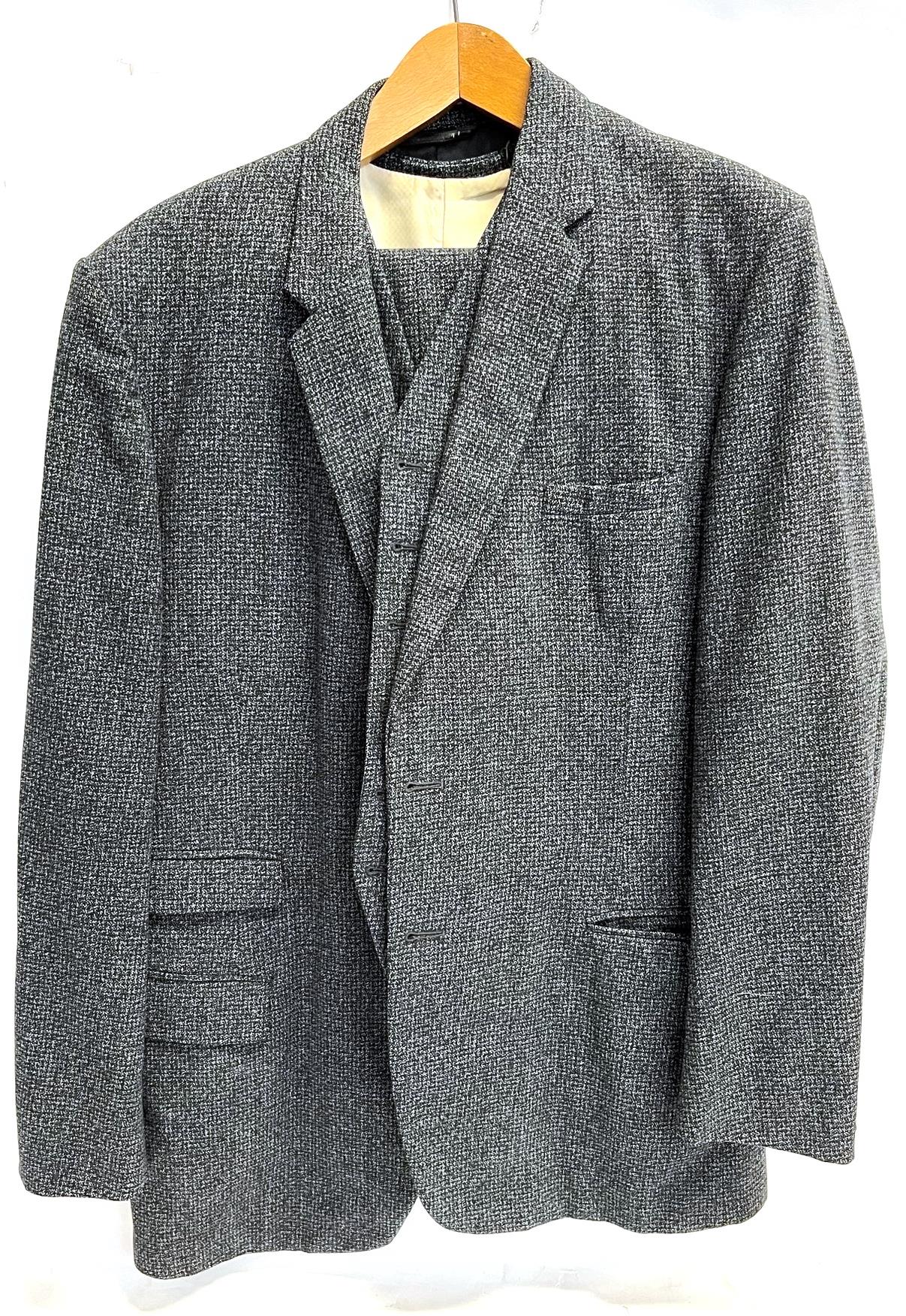 A GENTS THREE PIECE SUIT BY BURTONS.