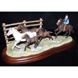 A BORDER FINE ARTS GROUP 'HORSES A3876, THE DRIFT, LIMITED EDITION O. 676/750', of a mounted rider