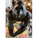 A LIFE SIZE LEATHER COVERED GORILLA IN THE MANNER OF DIMITRI OMERSA FOR LIBERTYS with glass eyes,
