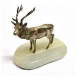 SILVER STAG ON CHALCEDONY PLINTH Standing 12cm tall, a majestic 10 point silver stag on a polished