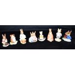 A COLLECTION OF BESWICK BEATRIX POTTER AND DOULTON BUNNIKINS FIGURES: Beswick 2529 'A Good Read', '