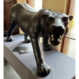 A LIFE SIZE LEATHER COVERED PANTHER IN THE MANNER OF DIMITRI OMERSA FOR LIBERTYS with glass eyes,