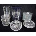 WATERFORD CRYSTAL: a Millennium Collection Champagne bottle coaster, boxed; a biscuit barrel and