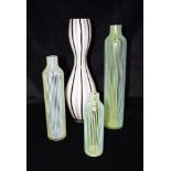 A GRADUATED SET OF THREE ART GLASS VASES of cylindrical form with narrow necks, with green latticino