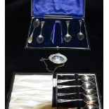 ASSORTMENT OF SILVER SPOONS & LABEL Six silver teaspoons with shell pattern handles, hallmarked