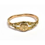 VICTORIAN PINCHBECK LOCKET BANGLE 22.8mm wide front section, decorated with scrolling ribbons and