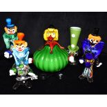 FOUR MURANO GLASS CLOWNS AND A DOG including one clown with globular body, the dog wearing spill