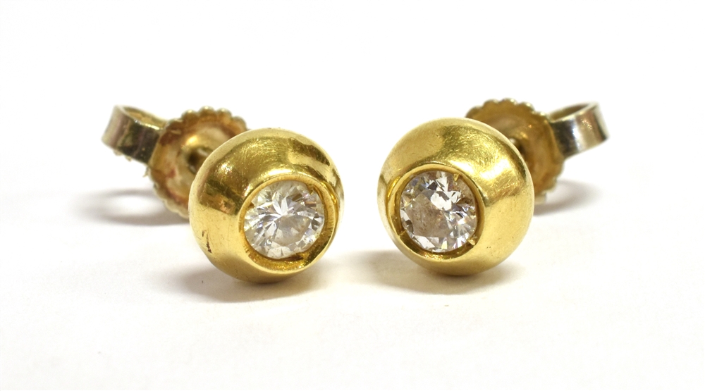DIAMOND & 18CT GOLD STUD EARRINGS 5.7mm diameter raised gold studs with invisibly set diamonds,