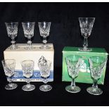 THREE MATCHING WATERFORD CRYSTAL 'KYLEMORE' PATTERN GLASSES 14cm high, boxed; together with a set of