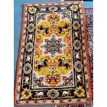 A WOOL RUG 117cm x 185cm