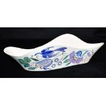A 1960S POOLE POTTERY FREEFORM WAVE SHAPE FLOWER TROUGH decorated in the E/TV pattern, artists