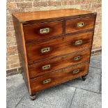 A VICTORIAN BRASS MOUNTED TWO SECTION CAMPAIGN CHEST fitted with two short and three long drawers,