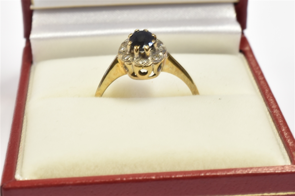 MODERN SAPPHIRE & DIAMOND CLUSTER RING A 10.5 x 8.0mm claw and grain set oval cluster, featuring a 6 - Image 2 of 6