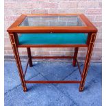 A MAHOGANY FLOOR-STANDING SHOP DISPLAY CABINET with bevelled glass panels to the top and sides,