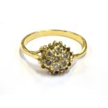 MODERN DIAMOND FLORAL CLUSTER RING 9.6mm diameter floral cluster, grain set with eight round