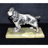 A COLD PAINTED BRONZE FIGURE OF A SPANIEL on onyx base, 18cm high overall Condition Report : good