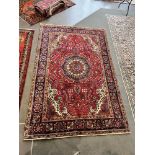 A NORTH WEST PERSIAN TABRIZ CARPET 305cm x 200cm