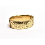 ANTIQUE ROLLED GOLD CUFF BANGLE 21.6mm wide hinged cuff bangle with foliate and scroll engraved