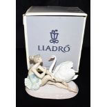 A BOXED LLADRO GROUP MODELLED AS A BALLERINA AND SWAN: 06204 'Grace and Beauty' Condition Report :