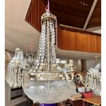 A LARGE GLASS CHANDELIER the central cut glass bowl with five lights to interior, six further lights