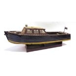 A MODEL OF A POLICE LAUNCH of principally wood construction, with a plank effect deck, the hull