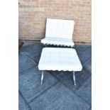 A MIES VAN DER ROHE 'BARCELONA' TYPE ARMCHAIR AND MATCHING FOOTSTOOL with white leather button