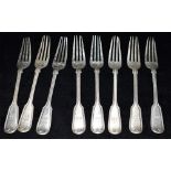 VICTORIAN SILVER TABLE FORKS Eight fiddle and thread pattern forks with monogrammed handles.