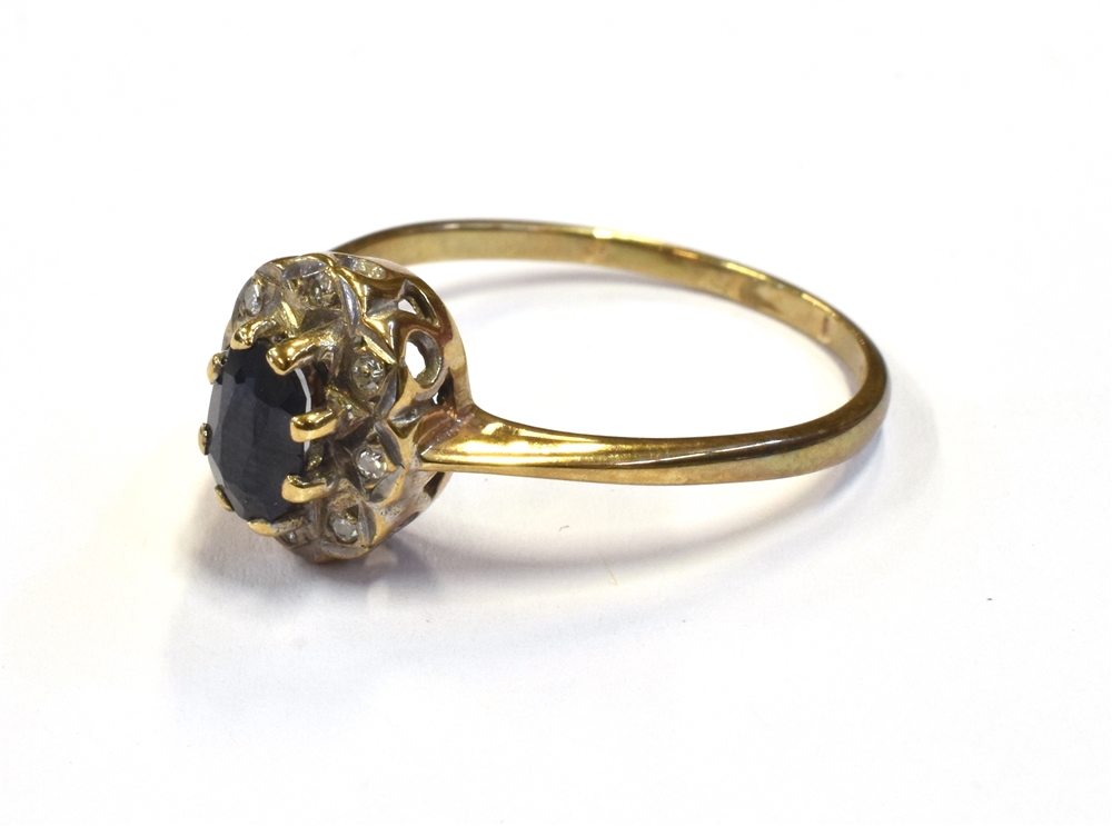 MODERN SAPPHIRE & DIAMOND CLUSTER RING A 10.5 x 8.0mm claw and grain set oval cluster, featuring a 6 - Image 4 of 6