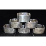 SET OF SIX SILVER NAPKIN RINGS Of octagonal form with plain sides, hallmarked Sheffield 1946. Weight