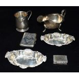 ASSORTED ANTIQUE SILVER ITEMS To include a pad foot sauce boat, an engraved cigarette case and snuff