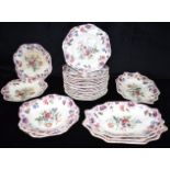 A COLLECTION OF SPODES 'NEW FAYENCE' comprising 17 octagonal plates 21cm diameter, four dishes