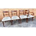 A SET OF FOUR REGENCY MAHOGANY DINING CHAIRS WITH BRASS INLAY including a carver
