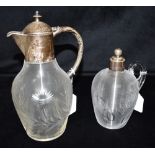 SILVER TOPPED DECANTERS & OTHER ITEMS One decanter stands 24cm tall, with silver spout and handle,