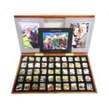 A DANBURY MINT 'LAST OF THE SUMMER WINE' PIN BADGE COLLECTION comprising fifty badges, in a wall-