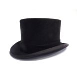 A BLACK BRUSHED FELT TOP HAT, BY CHRISTYS', LONDON size 7 1/4, in a plain card box. Condition Report