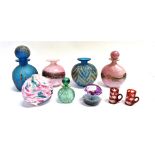 A COLLECTION OF DECORATIVE GLASS comprising a Mdina bottle and stopper and matching vase in pink