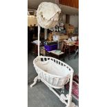 A LARGE CREAM PAINTED ROCKING CRADLE with canopy over, on stretcher base, approx 112cm long 186cm